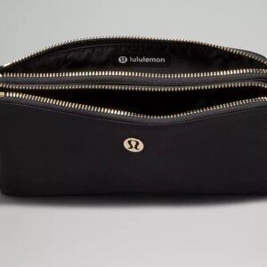 New with tags! Never used Curved Wristlet Lululemon